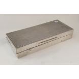 An Edwardian silver cigarette box with engraved de