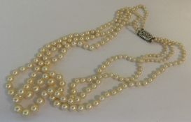 A good graduated three row pearl necklace. Approx.