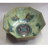 WEDGWOOD: A red Fairyland lustre bowl decorated wi