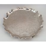 A George II circular silver salver engraved with s