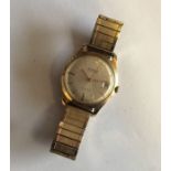 A gent's 9 carat Garrards' wristwatch with date ap