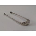 A rare pair of 18th Century Provincial sugar tongs