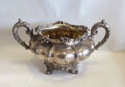 A good Victorian silver two handled sugar bowl wit
