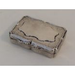 A Georgian silver snuff box attractively decorated