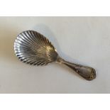 An Edwardian silver caddy spoon with shell bowl. S