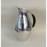 GEORG JENSEN: A rare silver tapering ewer of slend