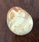 An unframed shell cameo depicting ladies. Est. £15