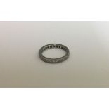 A good diamond full eternity ring in platinum sett