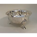 An Edwardian silver sugar bowl of Irish design. Lo