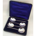A heavy set of four seal top spoons. London. Appro