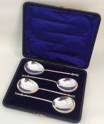 A heavy set of four seal top spoons. London. Appro