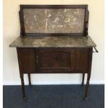 A mahogany and marble top wash stand. Est. £20 - £