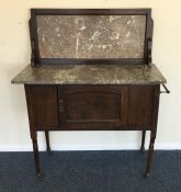 A mahogany and marble top wash stand. Est. £20 - £