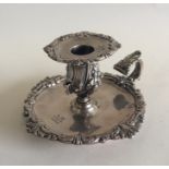 A good Victorian silver chamber stick with crested