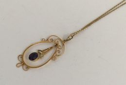 An amethyst and pearl drop pendant with loop top o