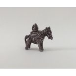 An unusual silver miniature figure of a donkey in