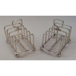 A good pair of Edwardian silver toast racks on bal