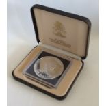 A Bahamas 5th Anniversary proof coin. Approx. 60 g