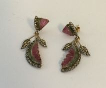 A stylish pair of tourmaline, ruby and diamond ear