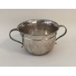 A silver two handled porringer. Birmingham. Approx