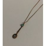 A 9 carat opal tow stone pendant on fine link chai