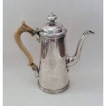 A good quality tapering silver coffee pot on reede