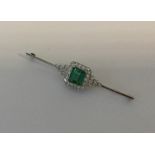 A large tourmaline and diamond Art Deco style broo