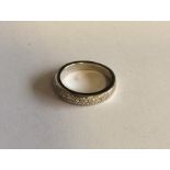 A good quality heavy diamond three row ring in 18