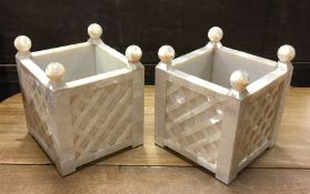 A pair of stylish MOP square planters with basketw