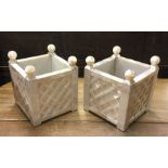 A pair of stylish MOP square planters with basketw