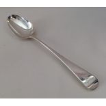A crested silver basting spoon of OE design. Londo