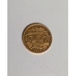 A Swiss 20 Franc Coin. Approx. 6.7 grams. Est. £20
