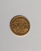 A Swiss 20 Franc Coin. Approx. 6.7 grams. Est. £20