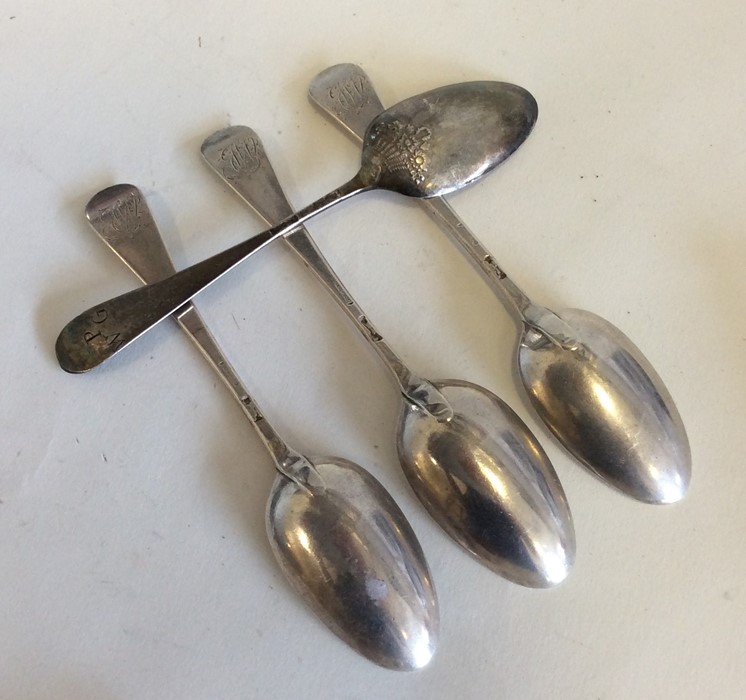 A group of four silver bottom marked teaspoons. Va