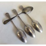 A group of four silver bottom marked teaspoons. Va