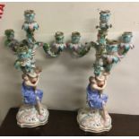 A tall pair of Continental candelabra decorated in