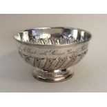 A heavy silver half fluted sugar bowl. London. By