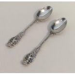 An attractive pair of chased Victorian silver spoo