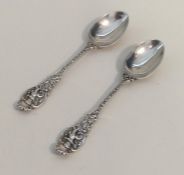 An attractive pair of chased Victorian silver spoo