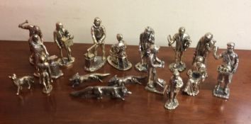 A collection of silver plated figures. Est. £20 -