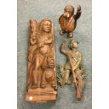 A large carving of a man with dog in relief etc. E