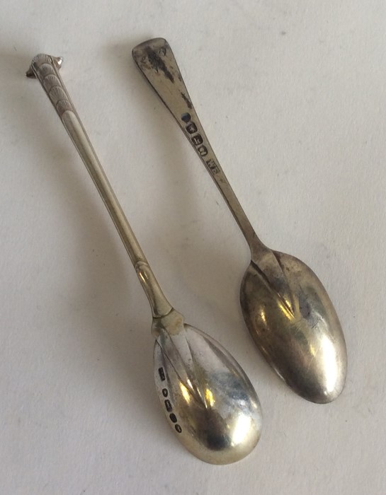 A Georgian silver gilt teaspoon. London. Together - Image 2 of 2