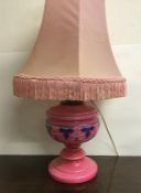 A pink glass lustre lamp. Est. £15 - £20.