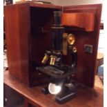 A mahogany cased Spencer microscope in case. Est.