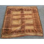 A small Oriental rug. Est. £25 - £35.
