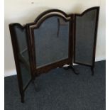 A mahogany triple mirror with outstretched legs. E