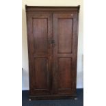 A good oak hall cupboard with panelled sides. Est.