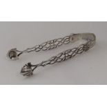 A good pair of heavy cast silver sugar tongs with