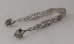 A good pair of heavy cast silver sugar tongs with