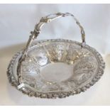 An unusual circular Georgian silver cake basket wi